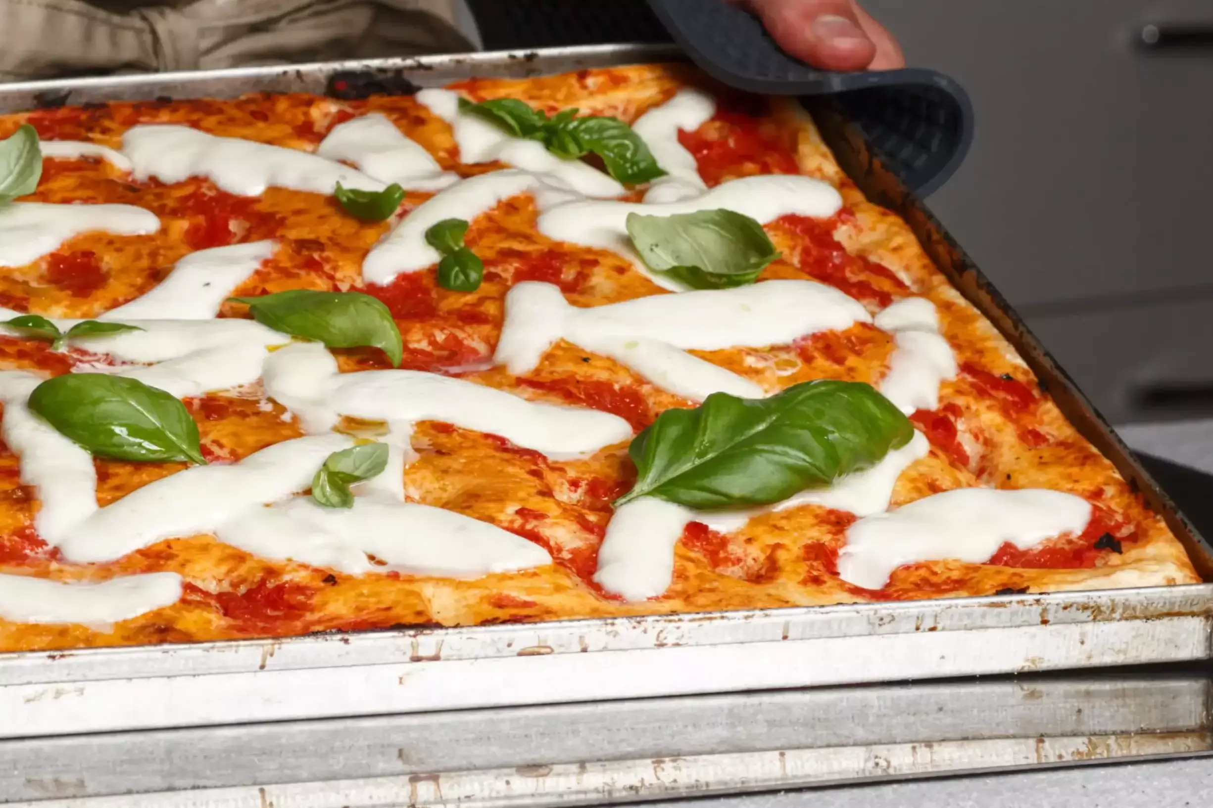 cuocere la pizza